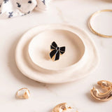 All The Ways To Say Pin, Black Bow
