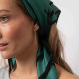 Ellen Beekmans Fijne verzilverde oorstekers met 5 platte balletjes