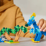 Plus-Plus LEARN TO BUILD Bouwset van 600 stuks met 2 bouwplaten, Dino's