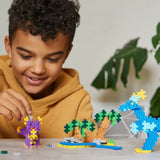 Plus-Plus LEARN TO BUILD Bouwset van 600 stuks met 2 bouwplaten, Dino's