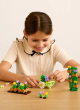Plus-Plus LEARN TO BUILD Bouwset van 600 stuks met 2 bouwplaten, Flower Shop