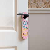 Puki Wuki Dubbelzijdige Deurhanger Happy - Sad, Wit & Roze