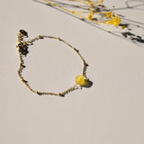 Vinoos COLOURS OF WINE Armband met gele glaskraal, A little joy