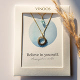 Vinoos COLOURS OF WINE Dubbele ketting met zon en oceaan blauwe glaskraal, Believe in yourself