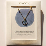 Vinoos COLOURS OF WINE Ketting met cirkel en blauwe glaskraal, Dreams come true